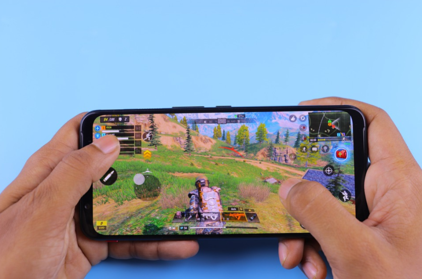 Mobile gaming demonstration shown on a smartphone screen during a technology showcase